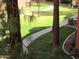 Landscaped pathways wind through lush greenery and mature trees, creating a serene environment at 12222 N Paradise Village S Pkwy # 325, Phoenix, AZ 85032