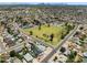 Aerial view of the neighborhood and nearby green space and tree coverage at 13207 N 55Th Ave, Glendale, AZ 85304