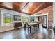 Charming dining room featuring a wood ceiling, ample natural light, and a view of the outdoors at 13207 N 55Th Ave, Glendale, AZ 85304