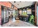 Versatile room with built-in shelves, exterior access, and views to dining area at 13207 N 55Th Ave, Glendale, AZ 85304
