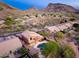 Beautiful desert home with a private pool and patio surrounded by beautiful desert landscaping at 14056 E Desert Cove Ave, Scottsdale, AZ 85259