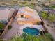 A beautiful home with a private backyard featuring a custom pool, spa and desert landscaping at 14056 E Desert Cove Ave, Scottsdale, AZ 85259