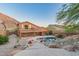 Expansive backyard with a pool, patio, and stunning desert views, creating a perfect outdoor retreat at 14056 E Desert Cove Ave, Scottsdale, AZ 85259