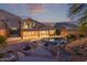Inviting backyard featuring a beautiful pool, spa, and desert landscaping with patio and views at 14056 E Desert Cove Ave, Scottsdale, AZ 85259