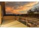A private balcony with views of the lush backyard and mountain backdrop makes this property desirable at 14056 E Desert Cove Ave, Scottsdale, AZ 85259