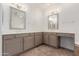 Bathroom featuring a double sink vanity with neutral gray cabinets and stylish fixtures at 14056 E Desert Cove Ave, Scottsdale, AZ 85259
