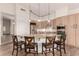 A gourmet kitchen with granite island, stainless appliances, and breakfast bar seating at 14056 E Desert Cove Ave, Scottsdale, AZ 85259
