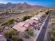 Desert home situated in quiet community, surrounded by mountain views and desert landscape at 14056 E Desert Cove Ave, Scottsdale, AZ 85259