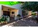Charming outdoor patio with ample seating, perfect for entertaining guests or enjoying a peaceful evening at 14112 W Larkspur Dr, Surprise, AZ 85379