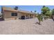 Expansive backyard featuring a patio and gravel landscaping, perfect for outdoor living and low maintenance at 1519 E Indian Wells Dr, Chandler, AZ 85249
