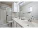 Bright bathroom featuring double sinks, a shower, and essential storage for a functional and stylish space at 1519 E Indian Wells Dr, Chandler, AZ 85249