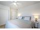 Cozy bedroom features a ceiling fan, closet, and soothing colors for a peaceful retreat at 1519 E Indian Wells Dr, Chandler, AZ 85249