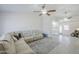 Expansive living room with a neutral color palette connects seamlessly to kitchen and relaxing lounge at 1519 E Indian Wells Dr, Chandler, AZ 85249
