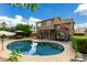 Serene backyard showcasing a large pool, spacious patio, and lush greenery for ultimate relaxation at 16823 S 24Th Pl, Phoenix, AZ 85048