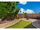 Cozy backyard showcasing a fire pit, charming landscaping, and a private setting at 16823 S 24Th Pl, Phoenix, AZ 85048