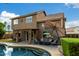 Relaxing backyard with a private pool, covered patio, and comfortable seating area for entertaining at 16823 S 24Th Pl, Phoenix, AZ 85048
