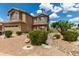 Charming two-story home featuring desert landscaping, a two-car garage, and beautiful curb appeal at 16823 S 24Th Pl, Phoenix, AZ 85048