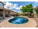 The outdoor pool area with patio is perfect for entertaining and relaxation at 16823 S 24Th Pl, Phoenix, AZ 85048