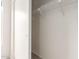 Bright, walk-in closet with white wire shelving and neutral carpet at 18219 N 19Th St, Phoenix, AZ 85022