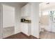 Hallway with storage cabinets in between a bedroom and bathroom at 18219 N 19Th St, Phoenix, AZ 85022