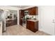 Well-appointed kitchen featuring stainless steel appliances, granite counters, and seamless access to the living areas at 18219 N 19Th St, Phoenix, AZ 85022