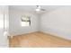 Clean and bright bedroom with laminate floors, creating a simple, inviting atmosphere at 18428 N 42Nd St, Phoenix, AZ 85032