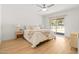 Calming bedroom with a king-size bed, sliding glass doors, and neutral decor at 18428 N 42Nd St, Phoenix, AZ 85032