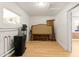Spacious storage room with white brick walls and laminate flooring, perfect for organization at 18428 N 42Nd St, Phoenix, AZ 85032