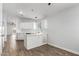 Eat-in kitchen features white cabinets and stainless steel appliances at 2015 E Glenhaven Dr, Phoenix, AZ 85048