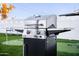 Backyard includes a stainless steel gas grill with side burner for outdoor cooking at 2023 N 79Th Pl, Scottsdale, AZ 85257