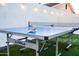 Backyard features a ping pong table for outdoor fun at 2023 N 79Th Pl, Scottsdale, AZ 85257