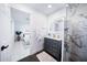 Contemporary bathroom layout showing vanity and shower; bedroom can be seen through a doorway at 2023 N 79Th Pl, Scottsdale, AZ 85257