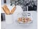 A cookie dish and cooking utensils sit on a white marble countertop with modern backsplash and pops of green at 2023 N 79Th Pl, Scottsdale, AZ 85257