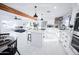 Open concept home features a modern kitchen with an island and stylish living space at 2023 N 79Th Pl, Scottsdale, AZ 85257
