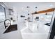 Bright, modern kitchen with a center island and an open layout to the living area at 2023 N 79Th Pl, Scottsdale, AZ 85257