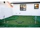Backyard putting green for leisurely practice at 2023 N 79Th Pl, Scottsdale, AZ 85257