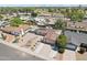 A lovely home featuring desert front yard, 2 car garage, sparkling backyard pool, and solar panels at 207 E Strahan Dr, Tempe, AZ 85283