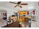 Bright kitchen featuring stainless steel appliances, an island with granite countertops, and tile floors at 207 E Strahan Dr, Tempe, AZ 85283