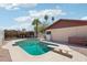 Backyard featuring a swimming pool and diving board surrounded by well manicured landscaping at 207 E Strahan Dr, Tempe, AZ 85283