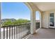 Balcony with wrought iron railing offering neighborhood views on a sunny day at 22306 N 34Th Pl, Phoenix, AZ 85050