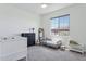 Bedroom with a crib, toddler bed and a large window at 22306 N 34Th Pl, Phoenix, AZ 85050