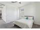 Cozy bedroom with plush carpeting, a window for natural light, and closet with sliding doors at 22306 N 34Th Pl, Phoenix, AZ 85050