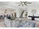 Bright living room features neutral decor, wood-look floors, and an open floor plan at 22306 N 34Th Pl, Phoenix, AZ 85050