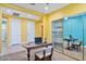 Bright office space with desk, chair, and mirrored storage cabinet at 25030 N 172Nd Ln, Surprise, AZ 85387