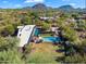 An expansive desert home has mountain views, an in-ground pool, and plenty of privacy at 25232 N Horseshoe Trl, Scottsdale, AZ 85255