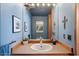Bathroom featuring a wooden vanity and blue painted walls at 25232 N Horseshoe Trl, Scottsdale, AZ 85255