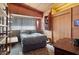Comfortable bedroom with built-in shelves and closet space at 25232 N Horseshoe Trl, Scottsdale, AZ 85255
