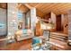 Bright and airy living room with high ceilings, clerestory windows, and tiled floor offering a comfortable living space at 25232 N Horseshoe Trl, Scottsdale, AZ 85255