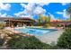 Relax in the backyard with a beautiful in-ground pool and multiple lounging areas, perfect for gatherings at 25232 N Horseshoe Trl, Scottsdale, AZ 85255