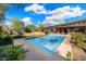 A perfectly sized pool sits just outside this home offering relaxation and entertainment at 25232 N Horseshoe Trl, Scottsdale, AZ 85255